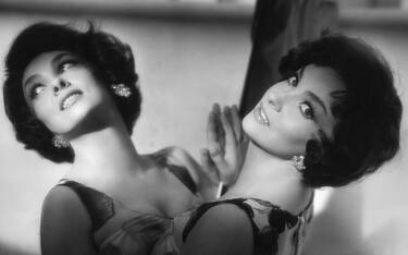Actress Gina Lollobrigida Leaning on a Mirror (Photo by �� John Springer Collection/CORBIS/Corbis via Getty Images)