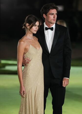 LOS ANGELES, CALIFORNIA, USA - SEPTEMBER 25: Model Kaia Gerber wearing a Celine dress and Tiffany & Co. jewelry and boyfriend Jacob Elordi wearing a Celine suit arrive at the Academy Museum of Motion Pictures Opening Gala held at the Academy Museum of Motion Pictures on September 25, 2021 in Los Angeles, California, United States., Credit:Xavier Collin / Avalon
