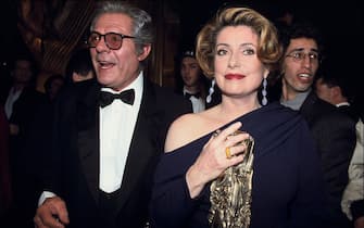FRANCE - FEBRUARY 01:  The 18 st "Cesar" awards Embargo Parillaud in Paris, France in February, 1993 - Catherine Deneuve, Cesar for the Best Actress with "Indochine" Regis Wargnier, Anne Parillaud.  (Photo by Pool ARNAL/PICOT/Gamma-Rapho via Getty Images)
