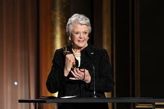HOLLYWOOD, CA - NOVEMBER 16:  Honoree Angela Lansbury accepts honorary award onstage during the Academy of Motion Picture Arts and Sciences' Governors Awards at The Ray Dolby Ballroom at Hollywood & Highland Center on November 16, 2013 in Hollywood, California.  (Photo by Kevin Winter/Getty Images)