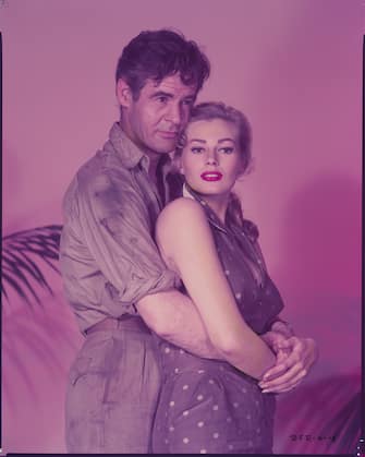 Robert Ryan and Anita Ekberg as Bill and Rena in Back from Eternity (Photo by ï¿½ï¿½ John Springer Collection/CORBIS/Corbis via Getty Images)