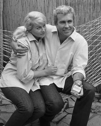 UNSPECIFIED - CIRCA 1964:  The Swedish actress Anita Ekberg and Rick Van Nutter her husband, about 1965.  (Photo by Roger Viollet Collection/Getty Images)