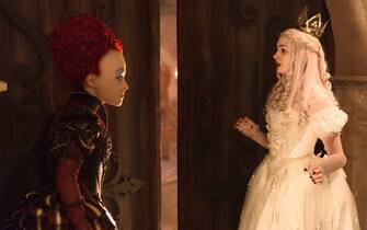 Helena Bonham Carter is the Red Queen and Anne Hathaway is the White Queen in Disney's ALICE THROUGH THE LOOKING GLASS, an all new adventure featuring the unforgettable characers from Lewis Carroll's beloved stories.