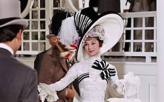USA.  Audrey Hepburn in a scene from the (C)Warner Bros film: My Fair Lady (1964).  Plot: In 1910s London, snobbish phonetics professor Henry Higgins agrees to a wager that he can make crude flower girl Eliza Doolittle presentable in high society.  Ref: LMK110-J7815-250122 Supplied by LMKMEDIA.  Editorial Only.  Landmark Media is not the copyright owner of these Film or TV stills but provides a service only for recognized Media outlets.  pictures@lmkmedia.com