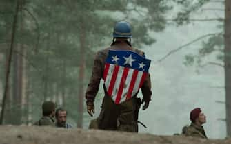 Chris Evans (standing, with shield) plays Steve Rogers, Bruno Ricci (center left) plays Dernier, and J.J. Feild (wearing red beret) plays Falsworth in Marvel Studios? CAPTAIN AMERICA: THE FIRST AVENGER. ?