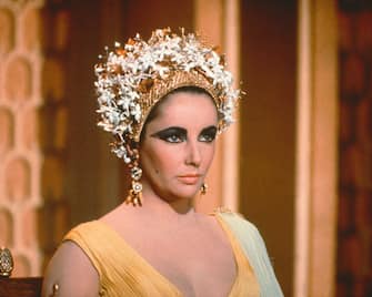 Elizabeth Taylor (1932-2011), British actress, in costume with gold jewellery in a publicity still issued for the film, 'Cleopatra', 1963. The historical drama, directed by Joseph L. Mankiewicz (1909Â 1993), starred Taylor as 'Cleopatra'. (Photo by Silver Screen Collection/Getty Images)