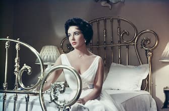 Actress Elizabeth Taylor (1932 - 2011) stars in the MGM film, 'Cat On A Hot Tin Roof', 1958. (Photo by Archive Photos/Getty Images)