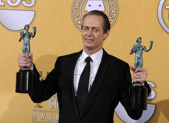 epa03986830 (FILE) A file picture dated shows US actor Steve Buscemi holding up his awards for Outstanding Performance by a male Actor in a Drama Series and Outstanding Performance by an Ensemble in a Drama Series for his performance in 'Boardwalk Empire' at the 18th Annual Screen Actors Guild Awards held at the Shrine Auditorium in Los Angeles, California, USA, 29 January 2012. Steve Buscemi has been nominated for a SAG award in the category Outstanding Performance by a Male Actor in a Drama Series for his role in 'Boardwalk Empire' at the 20th Screen Actors Guild Awards that will take place on 18 January 2014 in Los Angeles.  EPA/PAUL BUCK