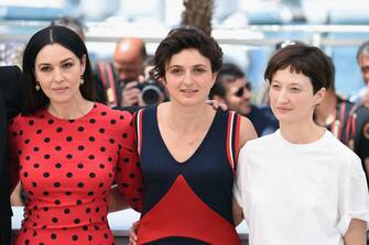 CANNES, FRANCE - MAY 18:  (L-R) Actress Monica Bellucci, director Alice Rohrwacher and Alba Rohrwacher attend "The Wonders" photocall at the 67th Annual Cannes Film Festival on May 18, 2014 in Cannes, France.  (Photo by Venturelli/WireImage)