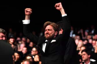 CANNES, FRANCE - MAY 28:  Director Ruben Ostlund celebrates after receiving the Palme d'Or for the movie "The Square" at the Closing Ceremony during the 70th annual Cannes Film Festival at Palais des Festivals on May 28, 2017 in Cannes, France.  (Photo by Pascal Le Segretain/Getty Images)