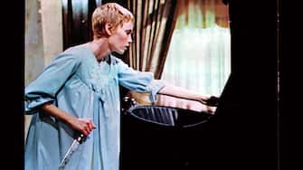 Mia Farrow clutches a knife in a scene from the film 'Rosemary's Baby', 1968. (Photo by Paramount/Getty Images)