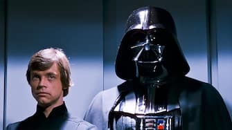 USA. David Prowse and Mark Hamill  in a scene from the (C)Twentieth Century Fox film: Star Wars: Return of the Jedi (1983).
 Plot: After a daring mission to rescue Han Solo from Jabba the Hutt, the Rebels dispatch to Endor to destroy the second Death Star. Meanwhile, Luke struggles to help Darth Vader back from the dark side without falling into the Emperor's trap. 
Ref: LMK110-J7166-080621 
Supplied by LMKMEDIA. Editorial Only.
Landmark Media is not the copyright owner of these Film or TV stills but provides a service only for recognised Media outlets. pictures@lmkmedia.com