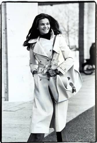 Florinda Bolkan wearing cotton trench coat by Calvin Klein, with shoulderbag by Jax. (Photo byÂ Bert Stern/CondÃ© Nast via Getty Images)