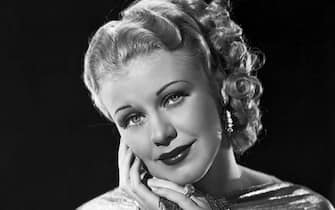 Beautiful Ginger Rogers, The Golden Girl, was never more alluring than in RKO- Radios Roberta. The glittering Metal Both of this Gown that matches her hair, makes a fitting mantle for her sparkling personality.