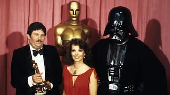 129042800 THE 50TH ANNUAL ACADEMY AWARDS - Show Coverage - Shoot Date: April 3, 1978. (Photo by Walt Disney Television via Getty Images Photo Archives/Walt Disney Television via Getty Images)
JOHN MOLLO;NATALIE WOOD;DARTH VADER