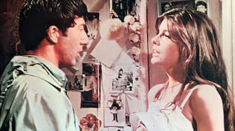 Dustin Hoffman talking with Katharine Ross in a scene from the film 'The Graduate', 1967. (Photo by Embassy Pictures/Getty Images)
