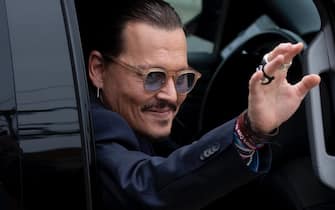 epa09980984 US actor Johnny Depp reacts as he leaves after closing arguments in the 50 million US dollar Depp vs Heard defamation trial at the Fairfax County Circuit Court in Fairfax, Virginia, USA, 27 May 2022. Johnny Depp's 50 million US dollar defamation lawsuit against Amber Heard started on 10 April.  EPA/MICHAEL REYNOLDS