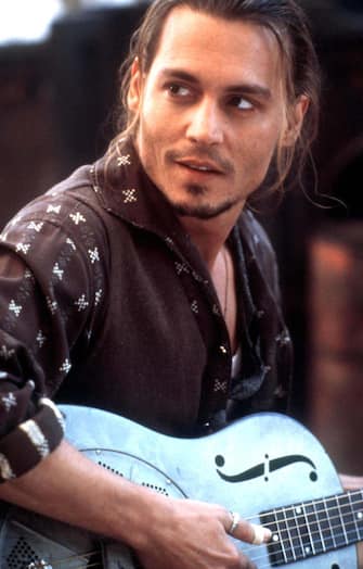 384099 04:  Rioux (Johnny Depp), a river drifter stops into a small town in France to shake things up in Lasse Hallstrom's and Miramax Films' romantic comedy, "Chocolat."  (Photo by David Appleby/Miramax Films/Newsmakers)