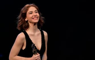 Italian actress Matilda De Angelis celebrates on stage after receiving the "European Shooting Stars" award during a ceremony at the 68th Berlinale film festival on February 19, 2018 in Berlin. / AFP PHOTO / Stefanie LOOS        (Photo credit should read STEFANIE LOOS/AFP via Getty Images)