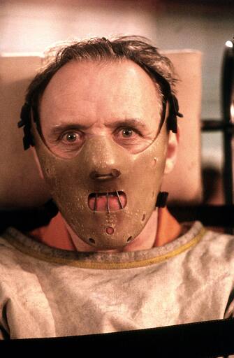 RELEASE DATE: February 14, 1991. MOVIE TITLE: The Silence of the Lambs. STUDIO: Orion Pictures. PLOT: A young FBI cadet must confide in an incarcerated and manipulative killer to receive his help on catching another serial killer who skins his victims. PICTURED: ANTHONY HOPKINS as Dr. Hannibal Lecter.