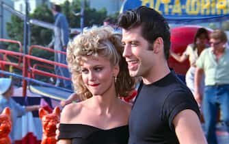 USA. Olivia Newton-John and John Travolta in a scene from the ©Paramount Pictures movie: Grease (1978).
Plot: Good girl Sandy Olsson and greaser Danny Zuko fell in love over the summer. When they unexpectedly discover they're now in the same high school, will they be able to rekindle their romance? 
Ref:  LMK110-J6741-140820
Supplied by LMKMEDIA. Editorial Only.
Landmark Media is not the copyright owner of these Film or TV stills but provides a service only for recognised Media outlets. pictures@lmkmedia.com