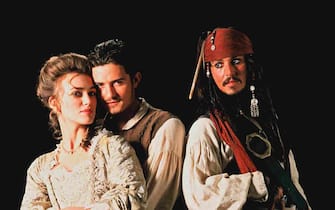 JOHNNY DEPP, ORLANDO BLOOM, KEIRA KNIGHTLEY
in Pirates Of The Caribbean
Filmstill - Editorial Use Only
Ref: FB
sales@capitalpictures.com
www.capitalpictures.com
Supplied by Capital Pictures
