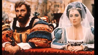 383758 01: Actors Elizabeth Taylor and Richard Burton kneel in a scene from the film "The Taming of the Shrew" 1973 in Italy. The film, based on Shakespeare's play of the same name, tells the story of two sisters and their family's struggle to find husbands for them. (Photo by Liaison)