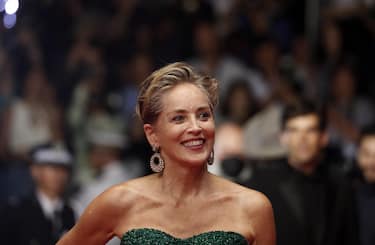 epa09970369 Sharon Stone arrives for the screening of 'Crimes of the Future' during the 75th annual Cannes Film Festival, in Cannes, France, 23 May 2022. The movie is presented in the Official Competition of the festival which runs from 17 to 28 May.  EPA/GUILLAUME HORCAJUELO
