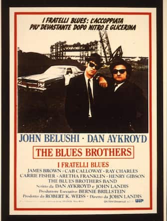 1980- ANNI 80, IL DISEGNO DELLA LOCANDINA, DEL MANIFESTO DEL FAMOSO FILM 'THE BLUES BROTHERS', DI JOHN LANDIS CON JOHN BELUSHI E DAN AYKROYD, RAPPRESENTAZIONE GRAFICA, ATTORI, PRODUZIONE CINEMATOGRAFICA, COLORE, CINEMA, 03-00009659
