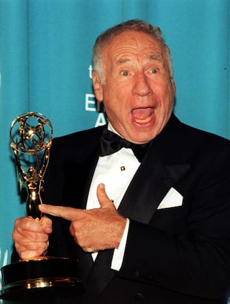 LOS ANGELES, UNITED STATES:  Comedian Mel Brooks points to his Emmy awardat the 50th Annual Primetime Emmy Awards 13 Sept at the Shrine Auditorium in Los Angeles.   Brooks won his Emmy for Outstanding Guest Actor in a Comedy Series for his role as Uncle Phil in "Mad About You". .   AFP PHOTO  Kim KULISH/mn (Photo credit should read KIM KULISH/AFP via Getty Images)