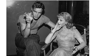 American actor Marlon Brando (1924 - 2004) and British stage and film actress Vivien Leigh (1913 - 1967) relax on the set of 'A Streetcar Named Desire', circa 1951. (Photo by Archive Photos/Getty Images)
