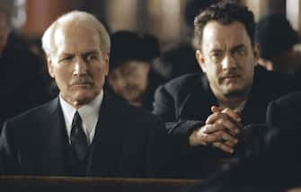 Jul 08, 2002; Los Angeles, CA, USA; Knowing he will be safe within the confines of a church, Michael 
Sullivan (actor TOM HANKS, L) confronts Mr. Rooney (PAUL NEWMAN) in DreamWorks Pictures