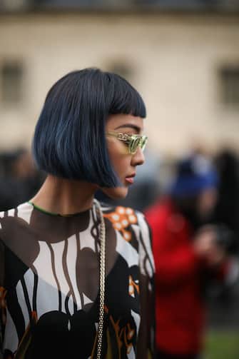 1210037208 PARIS, FRANCE - MARCH 01: Fashion Week guest is seen wearing a complete Valentino look outside Valentino show during Paris Fashion week Womenswear Fall/Winter 2020/2021 Day Seven on March 01, 2020 in Paris, France. (Photo by Jeremy Moeller/Getty Images)
