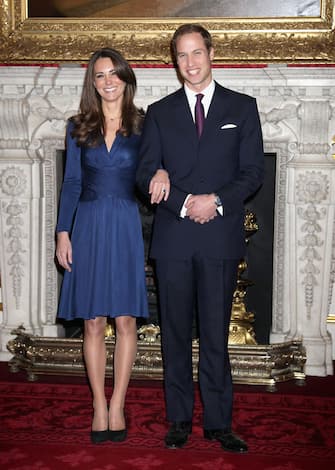 LONDON, ENGLAND - NOVEMBER 16:  Prince William and Kate Middleton pose for photographs in the State Apartments of St James Palace on November 16, 2010 in London, England. After much speculation, Clarence House today announced the engagement of Prince William to Kate Middleton. The couple will get married in either the Spring or Summer of next year and continue to live in North Wales while Prince William works as an air sea rescue pilot for the RAF. The couple became engaged during a recent holiday in Kenya having been together for eight years.  (Photo by Chris Jackson/Getty Images)