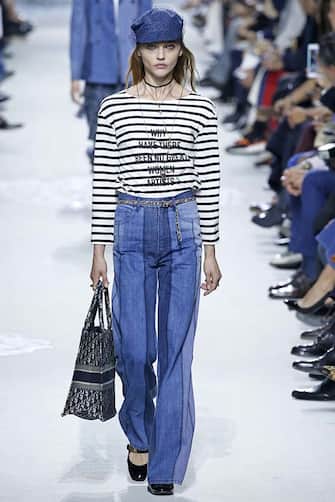 854980906 PARIS, FRANCE - SEPTEMBER 26: A model walks the runway during the Christian Dior Ready to Wear Spring/Summer 2018 fashion show as part of Paris Fashion Week at Musee Rodin on September 26, 2017 in Paris, France. (Photo by Victor VIRGILE/Gamma-Rapho via Getty Images)