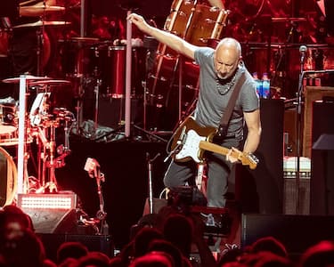 Pete Townshend of British rock band "The Who" performs at the Toyota Center on the second leg of their Moving On! tour on September 25, 2019 in Houston, Texas. (Photo by SUZANNE CORDEIRO / AFP)        (Photo credit should read SUZANNE CORDEIRO/AFP via Getty Images)