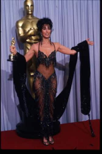 049944 35: Actress Cher holds her Best Actress in a Leading Role Oscar for "Moonstruck" at the Academy Awards April 11, 1988 in Los Angeles, CA. The Academy Awards are prizes given out annually in Hollywood for excellence in film performance and production. (Photo by John Barr/Liaison)