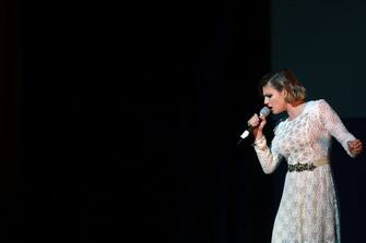 VENICE, ITALY - MARCH 01:  Italian singer Emma Marrone performs on stage during the Gran Ballo della Cavalchina at La Fenice Theatre on March 1, 2014 in Venice, Italy.  (Photo by Barbara Zanon/Getty Images)