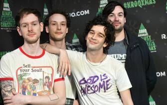 ANAHEIM, CALIFORNIA - DECEMBER 08:  (L-R) Musicians Adam Hann, George Daniel, Matthew Healy and Ross MacDonald of The 1975 attend the KROQ Absolut Almost Acoustic Christmas 2019 at Honda Center on December 08, 2019 in Anaheim, California. (Photo by Scott Dudelson/Getty Images)
