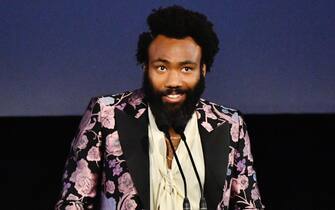 1185345892 LOS ANGELES, CALIFORNIA - NOVEMBER 02: Donald Glover, wearing Gucci, speaks onstage during the 2019 LACMA Art + Film Gala Presented By Gucci at LACMA on November 02, 2019 in Los Angeles, California. (Photo by Emma McIntyre/Getty Images for LACMA)