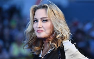 US singer-songwriter Madonna poses arriving on the carpet to attend a special screening of the film "The Beatles Eight Days A Week: The Touring Years" in London on September 15, 2016. / AFP / Ben STANSALL        (Photo credit should read BEN STANSALL/AFP via Getty Images)