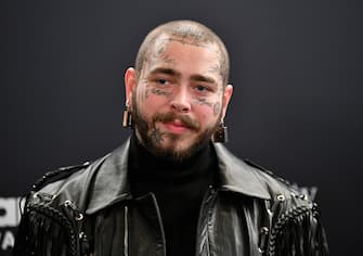 HOLLYWOOD, CALIFORNIA - OCTOBER 14: In this image released on October 14, Post Malone poses backstage at the 2020 Billboard Music Awards, broadcast on October 14, 2020 at the Dolby Theatre in Los Angeles, CA.  (Photo by Amy Sussman/BBMA2020/Getty Images for dcp )