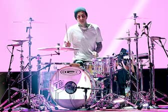 LOS ANGELES, CALIFORNIA - NOVEMBER 22: In this image released on November 22, Travis Barker performs onstage for the 2020 American Music Awards at Microsoft Theater on November 22, 2020 in Los Angeles, California. (Photo by Kevin Mazur/AMA2020/Getty Images for dcp)