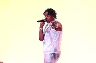 LOS ANGELES, CALIFORNIA - NOVEMBER 22: In this image released on November 22, Lil Baby performs onstage for the 2020 American Music Awards at Microsoft Theater on November 22, 2020 in Los Angeles, California. (Photo by Kevin Mazur/Getty Images for dcp)