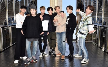 NEW YORK, NY - MAY 21: (EXCLUSIVE COVERAGE)   V, Suga, Jin, Jungkook, RM, Jimin, and J-Hope of the K-Pop Group BTS visit The Empire State Building on May 21, 2019 in New York City.  (Photo by Steven Ferdman/Getty Images for ESB)