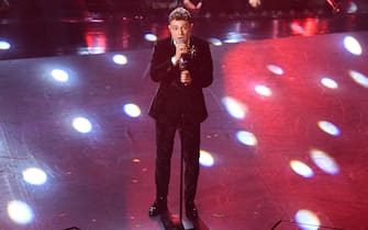 SANREMO, ITALY - FEBRUARY 05:   Irama performs on stage during the first night of the 69th Sanremo Music Festival at Teatro Ariston on February 05, 2019 in Sanremo, Italy. (Photo by Daniele Venturelli/Daniele Venturelli/WireImage)