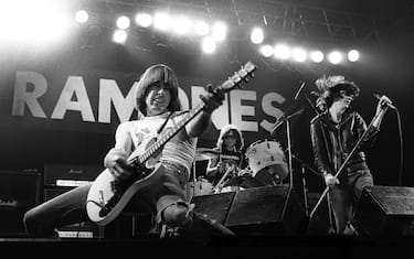 UNITED KINGDOM - DECEMBER 21:  MANCHESTER APOLLO  Photo of RAMONES and Johnny RAMONE and Joey RAMONE and Tommy RAMONE, L-R Johnny, Tommy (drums) and Joey Ramone performing on stage  (Photo by Howard Barlow/Redferns)