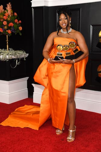 LOS ANGELES, CALIFORNIA - MARCH 14: Megan Thee Stallion, winner of the Best Rap Performance and Best Rap Song awards for 'Savage' and the Best New Artist award, poses in the media room during the 63rd Annual GRAMMY Awards at Los Angeles Convention Center on March 14, 2021 in Los Angeles, California. (Photo by Kevin Mazur/Getty Images for The Recording Academy )