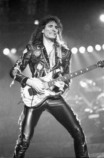 Guitarist Steve Vai is shown performing on stage during a "live" concert appearance with Whitesnake on July 27, 1988. (Photo by John Atashian/Getty Images)