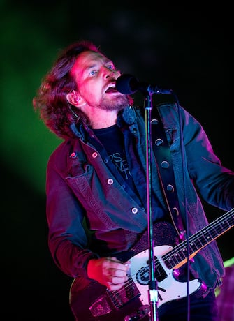 NEWPORT, UNITED KINGDOM - JUNE 23:  (EUROPEAN SALES  ONLY)  Eddie Vedder of Pearl Jam performs on the main stage as the headlining act on day 3 of The Isle of Wight Festival at Seaclose Park on June 23, 2012 in Newport, Isle of Wight. (Photo by Samir Hussein/Getty Images)